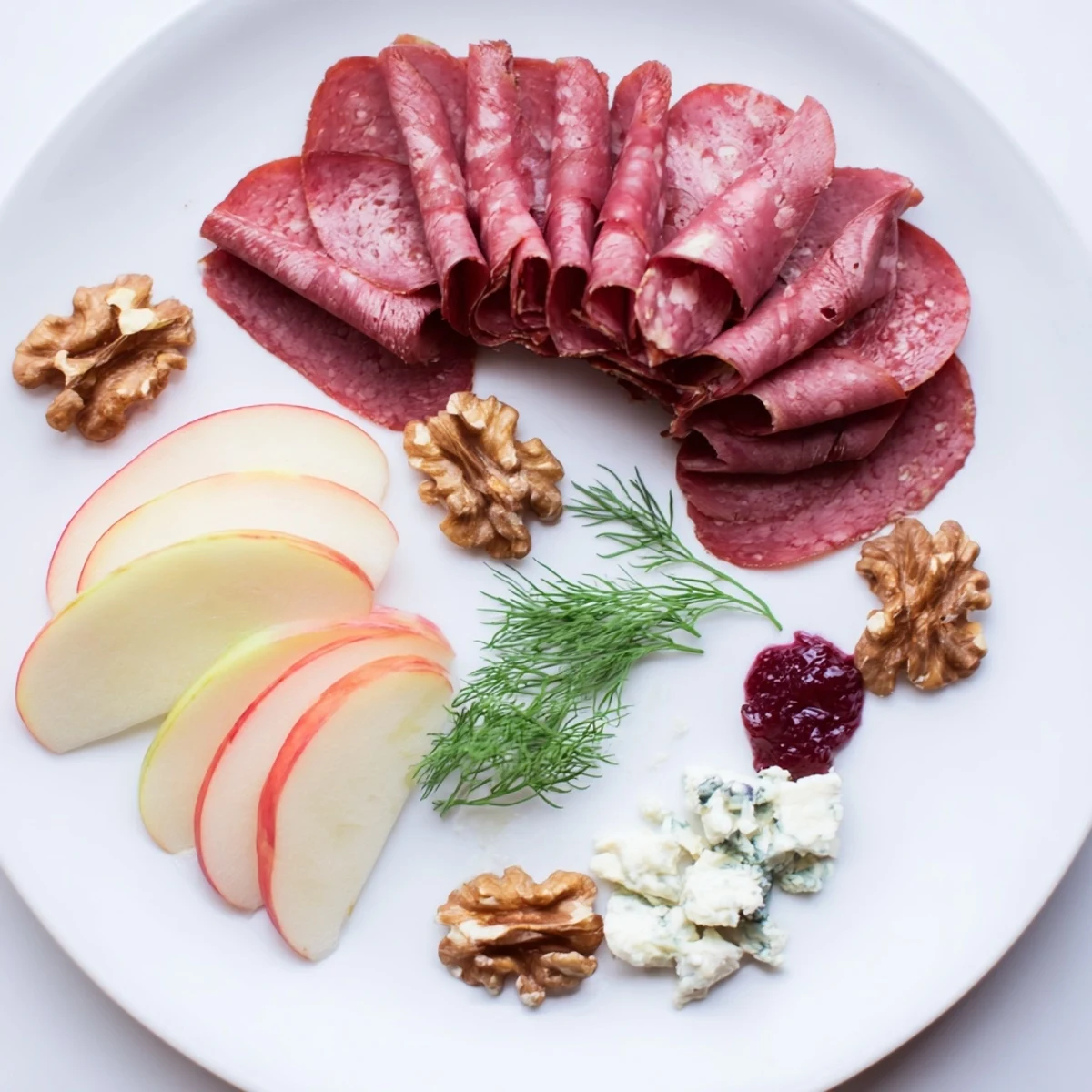 Reindeer Charcuterie Platter artfully arranged with meats, cheeses, and colorful garnishes ready to serve.