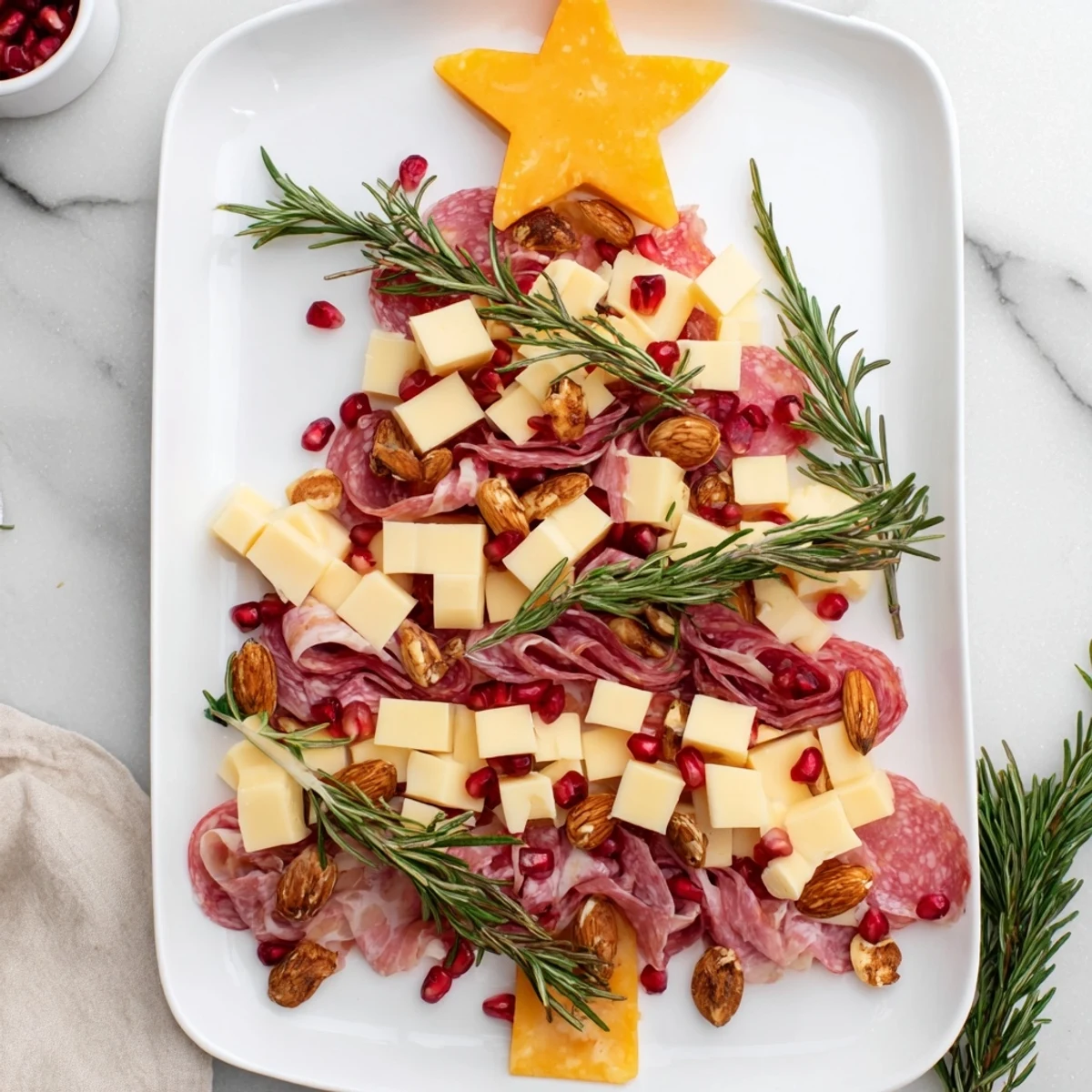 A vibrant Christmas Tree Charcuterie Dream overflowing with cheeses, meats, and colorful fruits for entertaining.