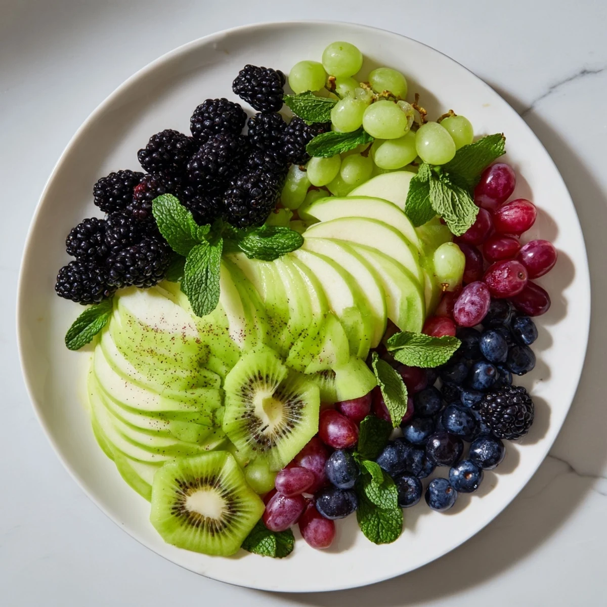 A vivid Aurora Borealis Sweep, a stunning fruit platter with green and purple fruit waves displayed.