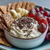 2. Silky Cottage Cheese Cookie Dough Dip swirled with mini chocolate chips, perfect for dipping colorful fruit.  