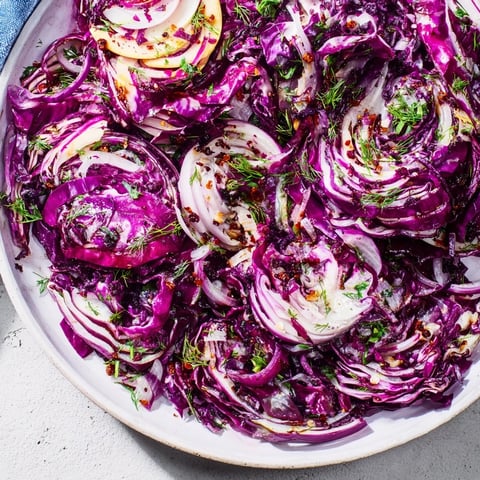 A steaming, just-baked Spiced Red Cabbage, showcasing a vibrant color and aromatic spices.
