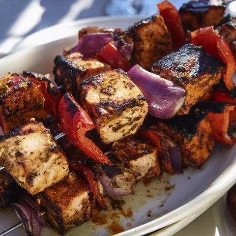 Fragrant Glühwein-Marinated Chicken Skewers, beautifully charred, ready for delicious serving with fresh sides.