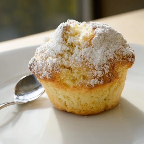 Fluffy Quark Muffins, golden-brown and fresh from the oven, ready for a delicious breakfast treat.
