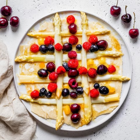 Crisp asparagus and berries beautifully woven into a stunning Botanical Lattice appetizer.