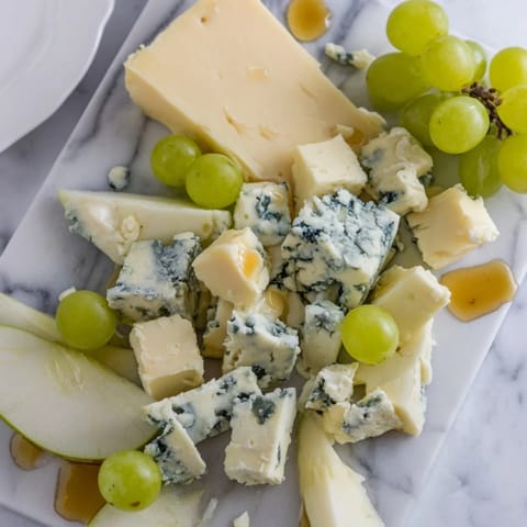 Irregular blue cheese and cheddar pieces form a flavorful "Marble Quarry" appetizer arrangement.