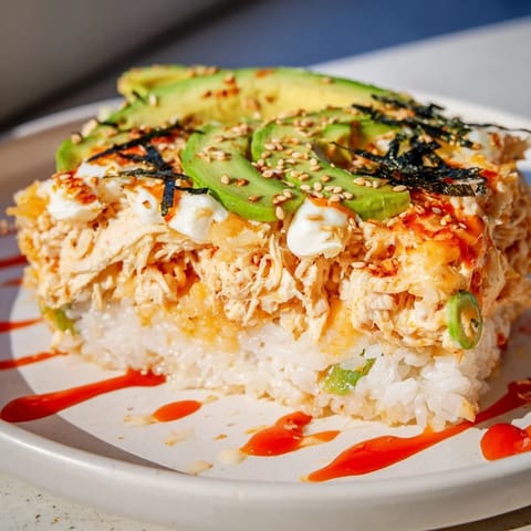 Golden-brown Chicken Sushi Bake, a savory casserole with seasoned rice and shredded chicken.
