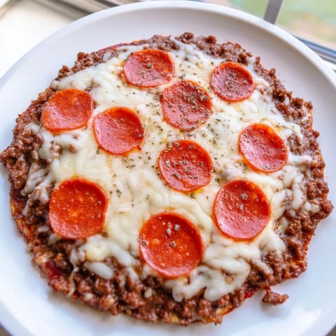Golden pepperoni topping the Meat Pizza Pepperoni Stack after baking, ready to be sliced and served.